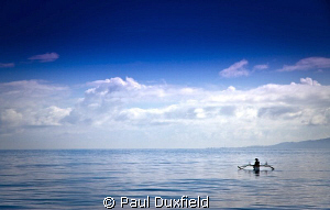 Calm and tranquility, as this lone fisherman waits patien... by Paul Duxfield 